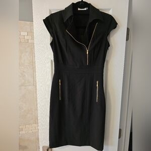 Elegant Black Dress with Gold Accents